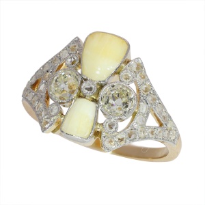 Unusual Art Deco Ring with Old Cut Diamonds and Two Baby Teeth, c. 1920